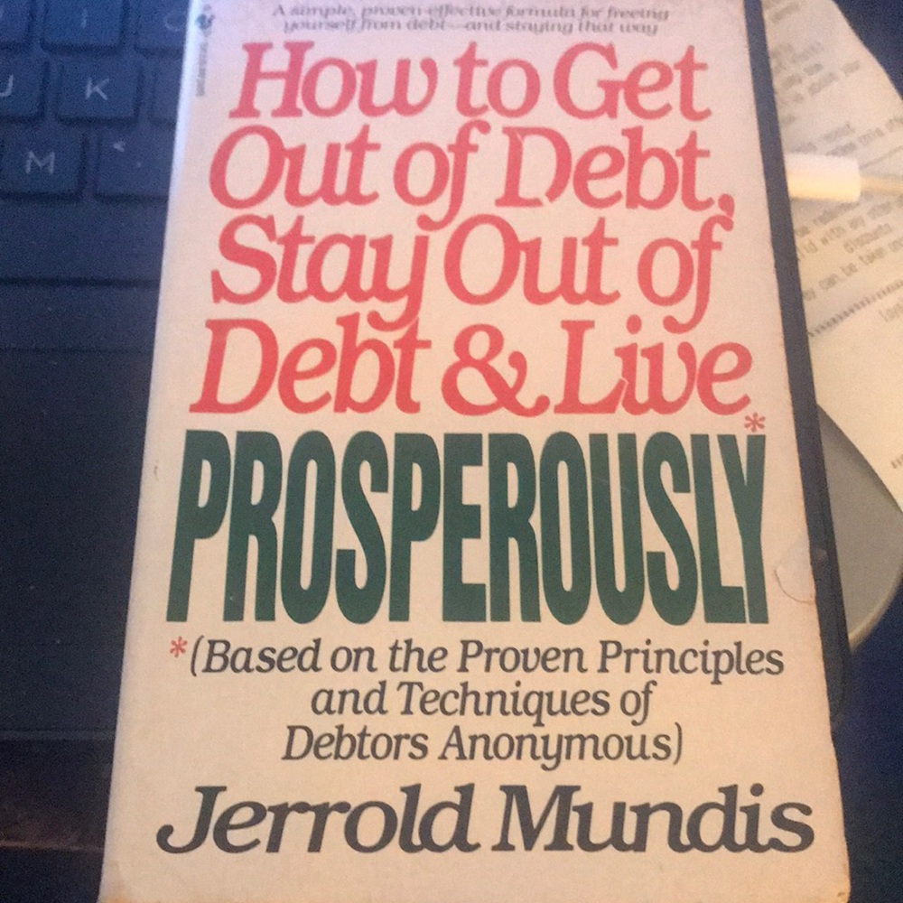 How to Get Out of Debt Book by Jerrold Mundis